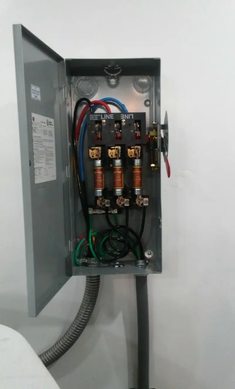 Three-phase disconnect switch installed for Smoke Detector Installation in The Homesteads